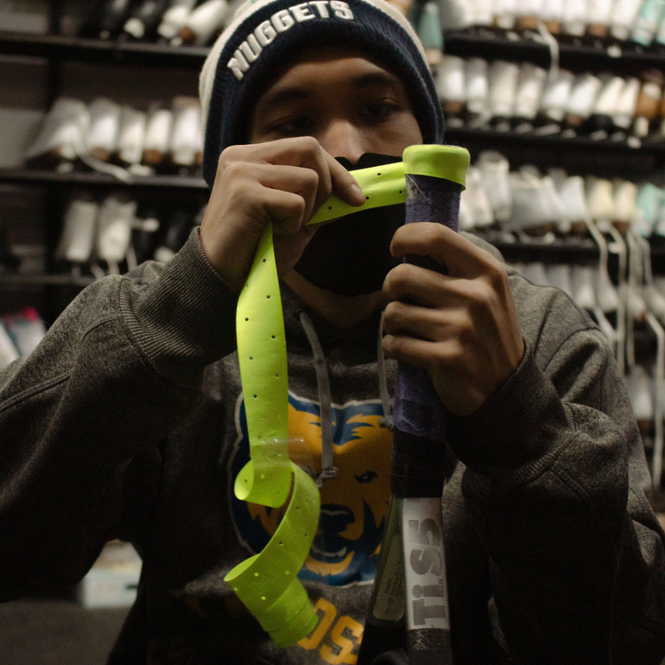 Tennis racquet getting regripped